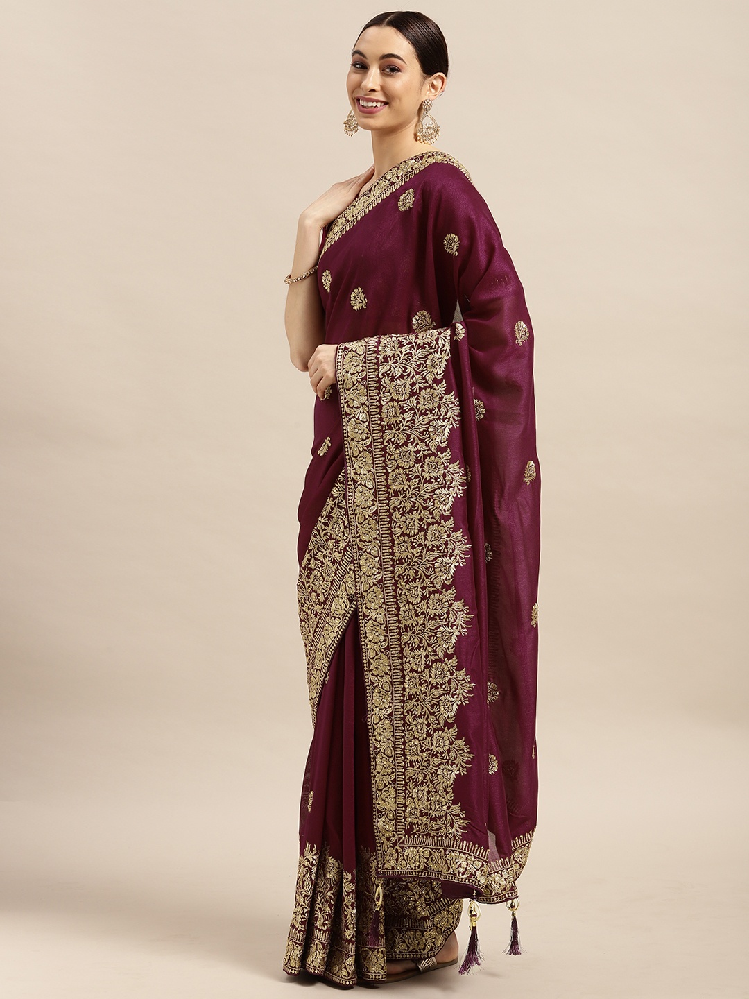 

Mitera Maroon Ethnic Motifs Silk Blend Saree