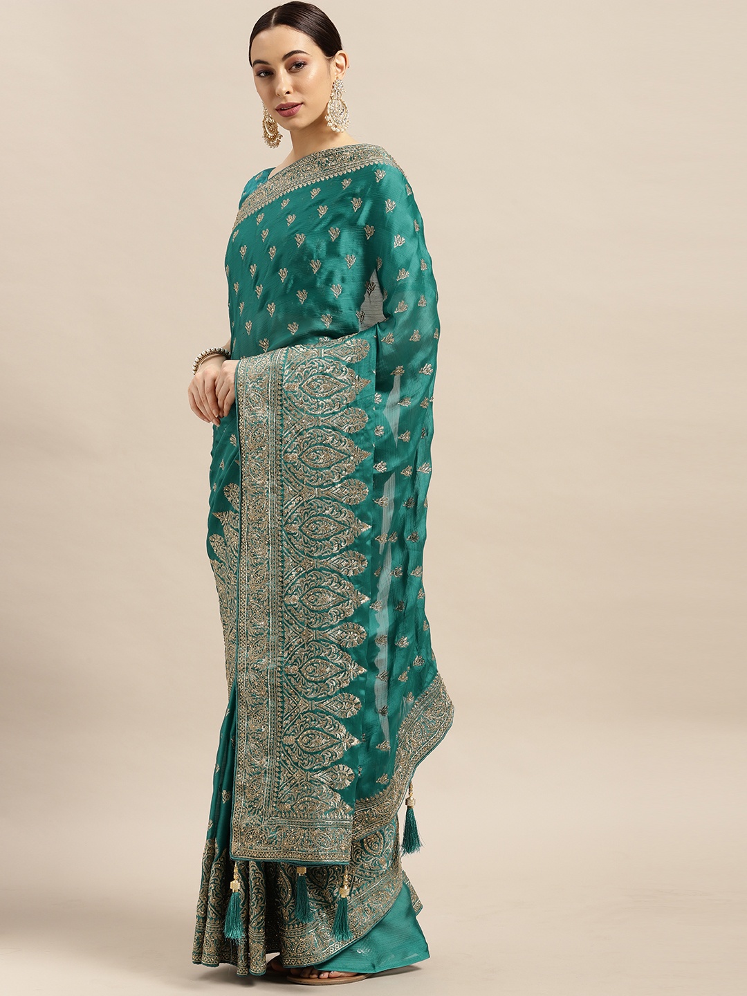 

Mitera Teal Green Ethnic Motifs Embellished Saree