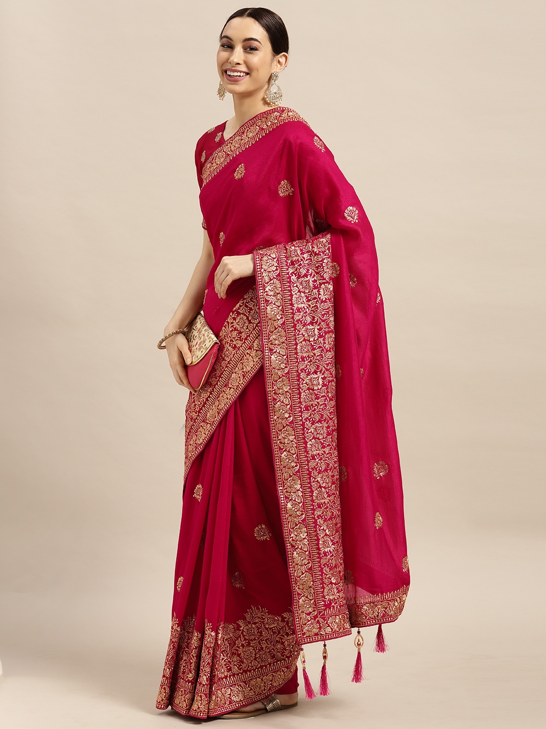 

Mitera Pink Ethnic Motifs Silk Blend Saree