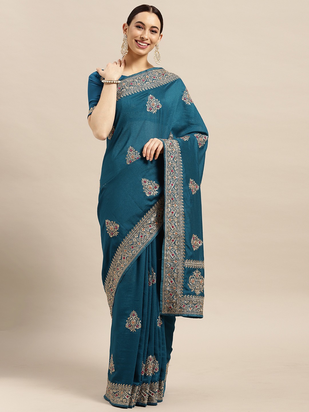 

Mitera Teal Blue Ethnic Motifs Embellished Saree