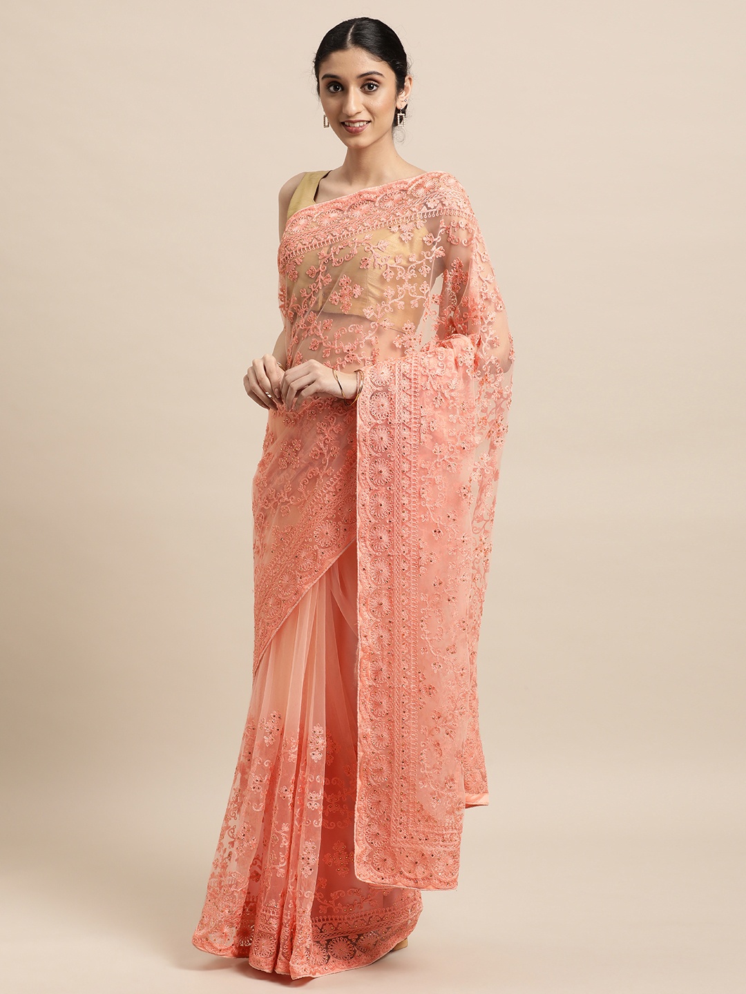 

VASTRANAND Peach-Coloured Ethnic Motifs Net Saree
