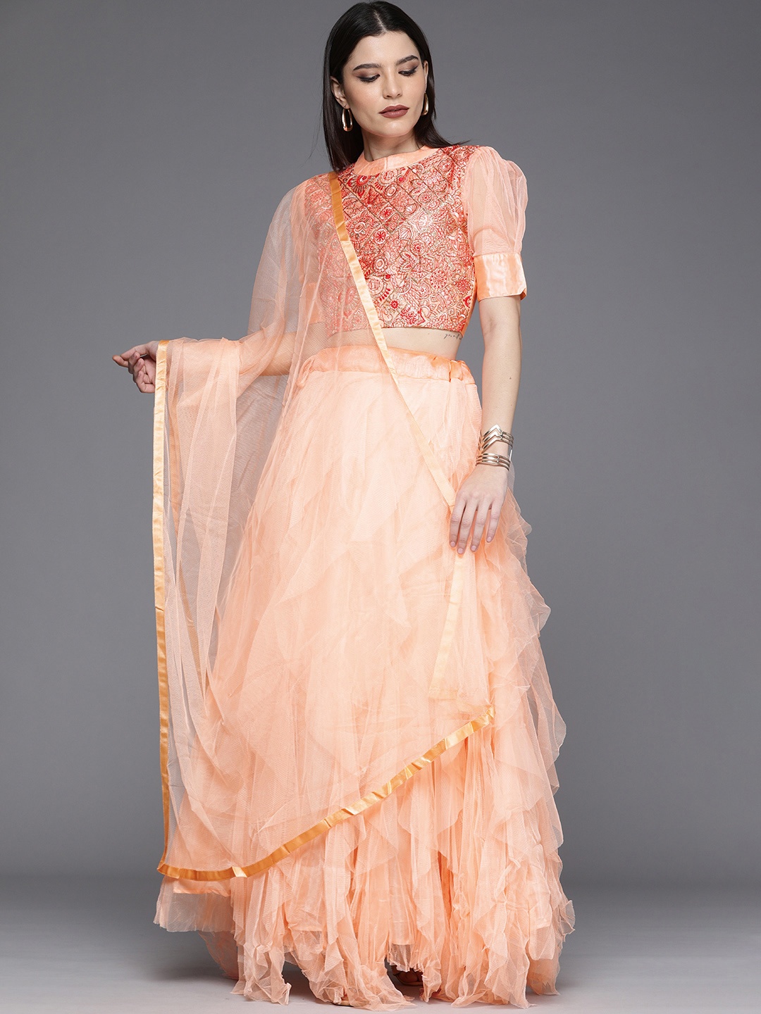 

Mitera Orange Semi-Stitched Lehenga & Unstitched Blouse With Dupatta