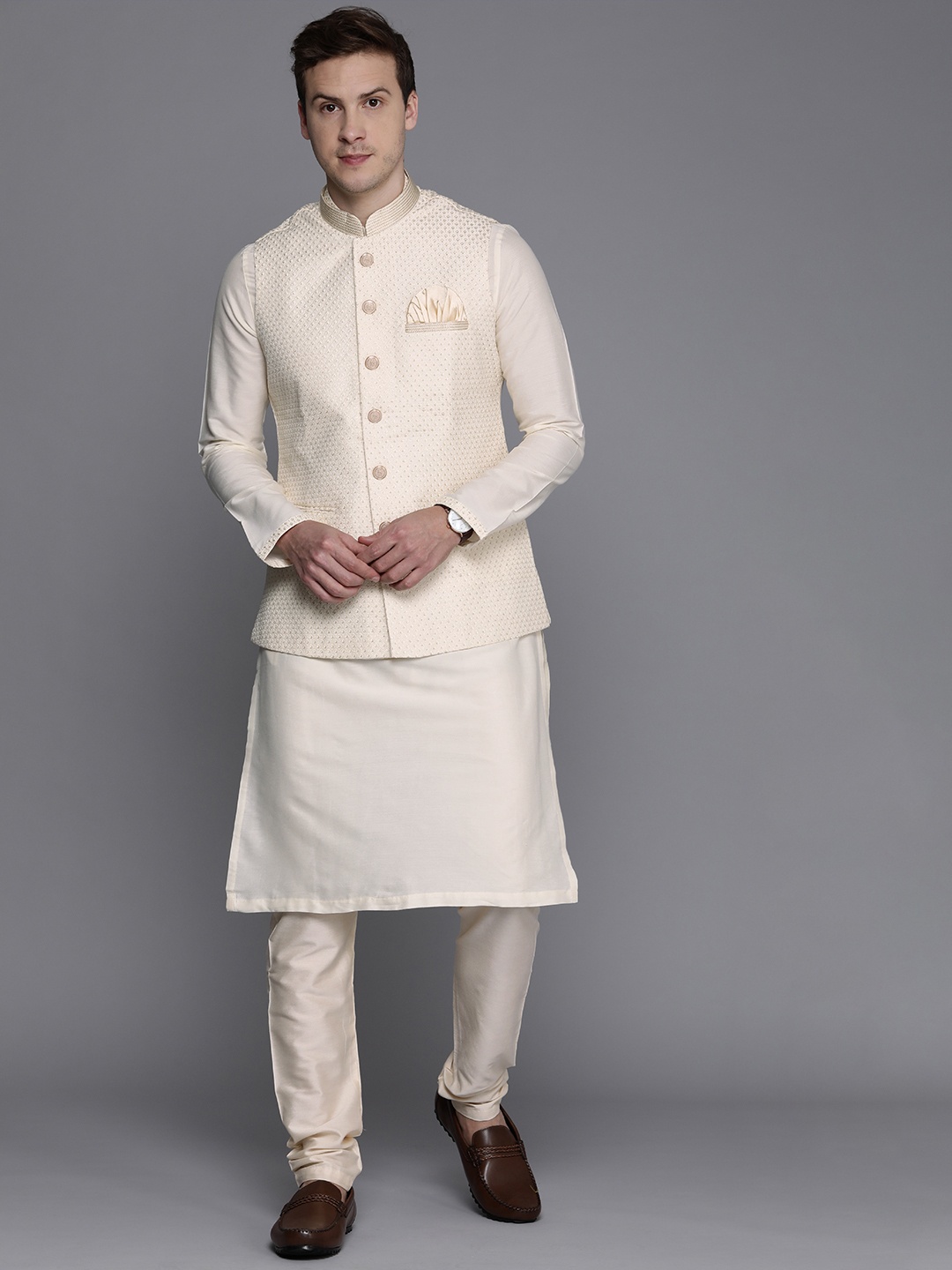 

Manyavar Men Off White Yoke Design Thread Work Art Silk Kurta with Churidar & Nehru Jacket