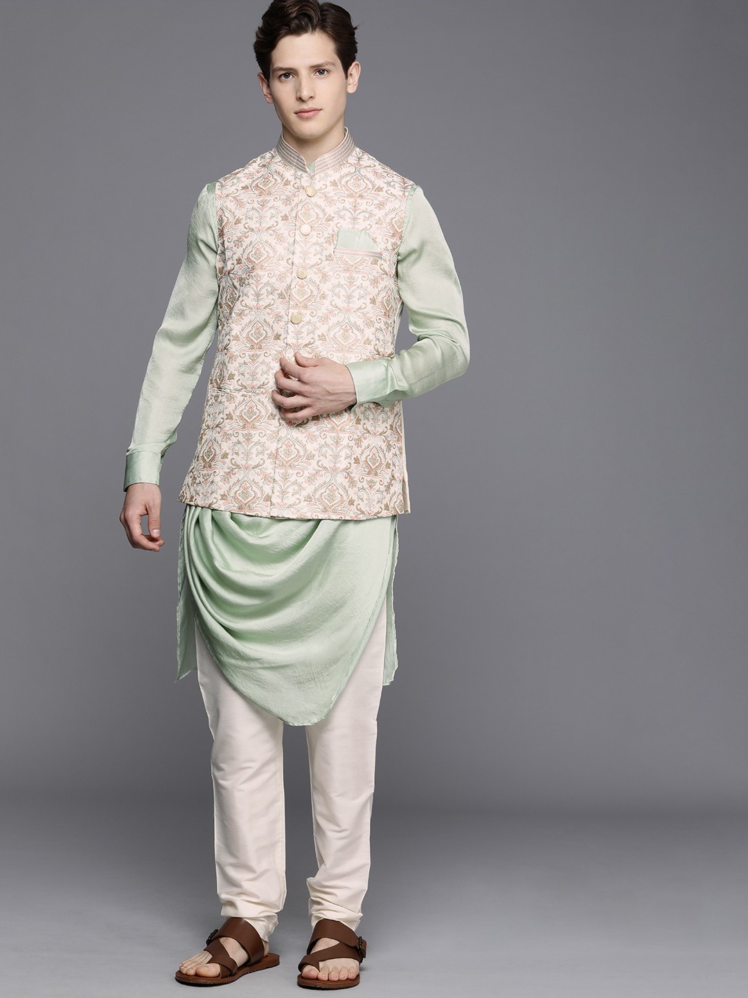 

Manyavar Men Green Solid Pleated Thread Work Art Silk Kurta with Churidar & Nehru Jacket