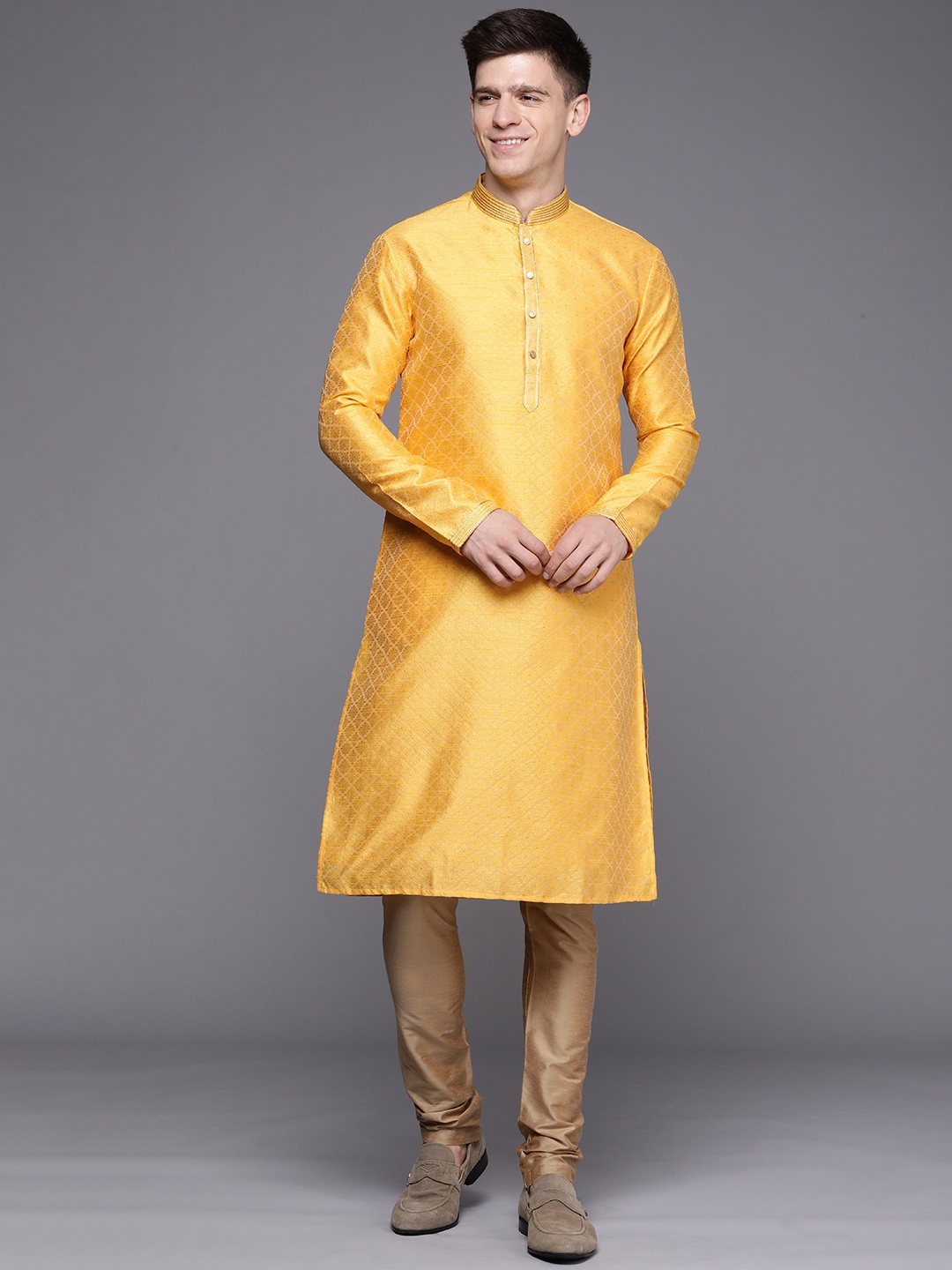 

Manyavar Men Yellow Ethnic Motifs Woven Design Mandarin Collar Kurta Churidar Set