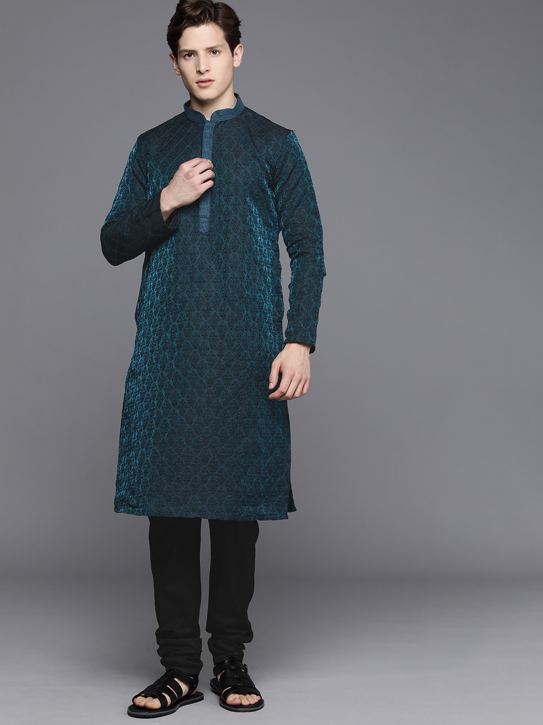 

Manyavar Men Teal Blue & Black Ethnic Motifs Art Silk Jacquard Kurta with Churidar