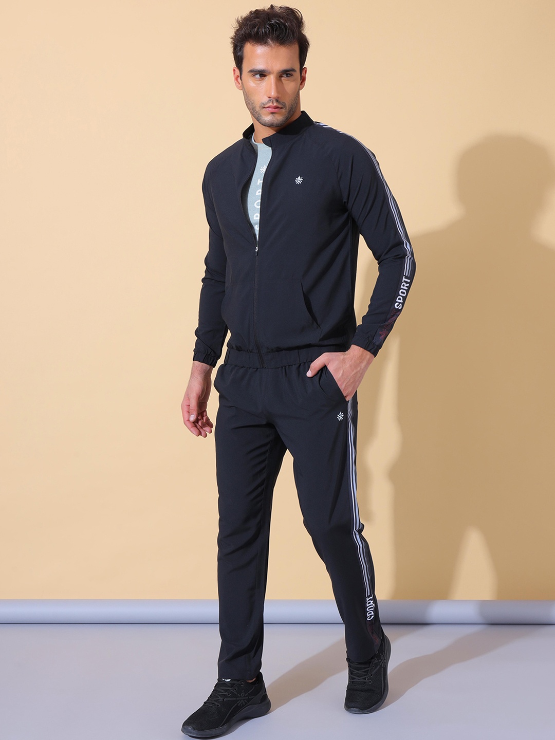 

Cultsport Men Black Solid Tracksuit