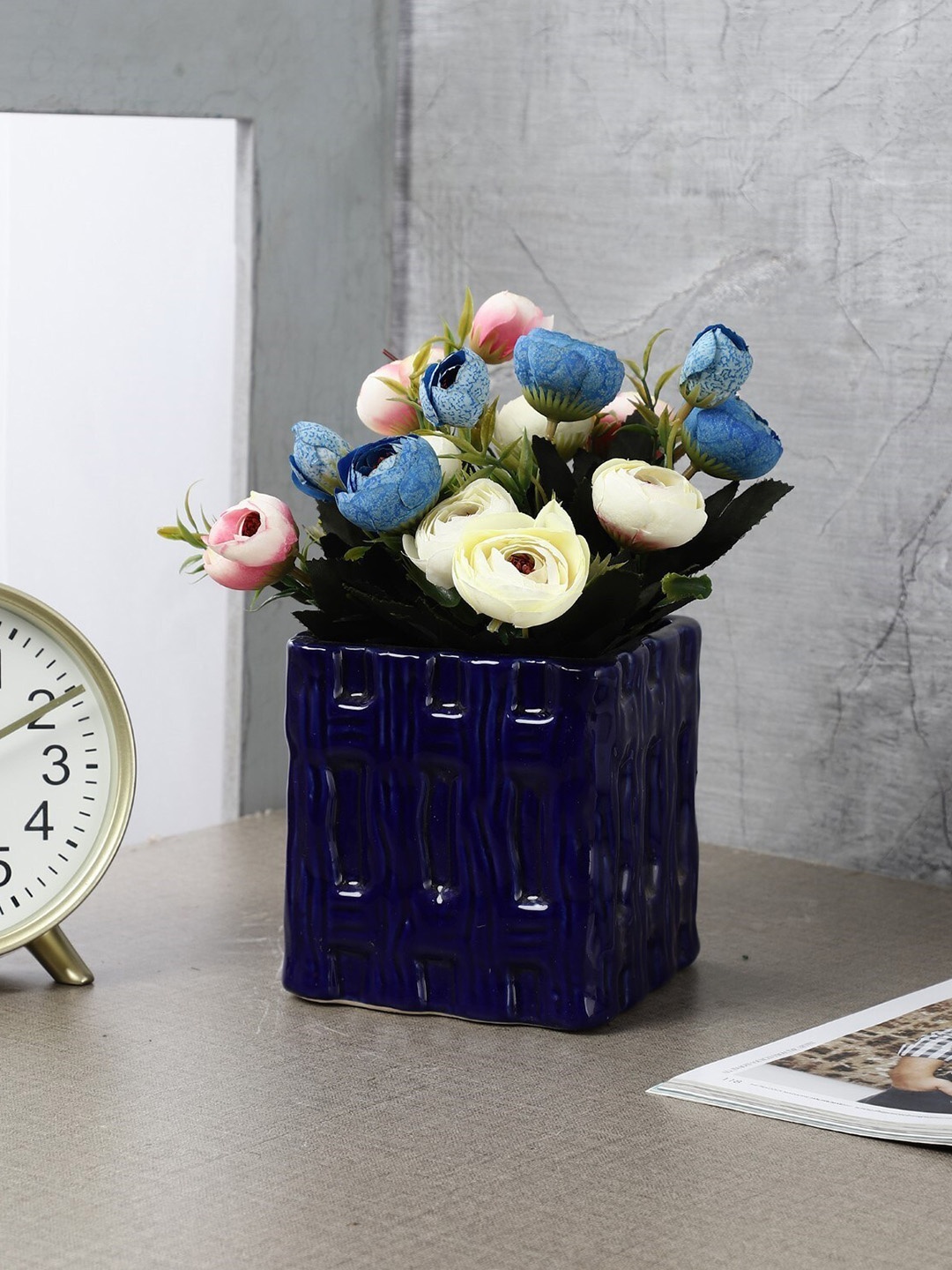

The Decor Mart Blue Textured Ceramic Planter