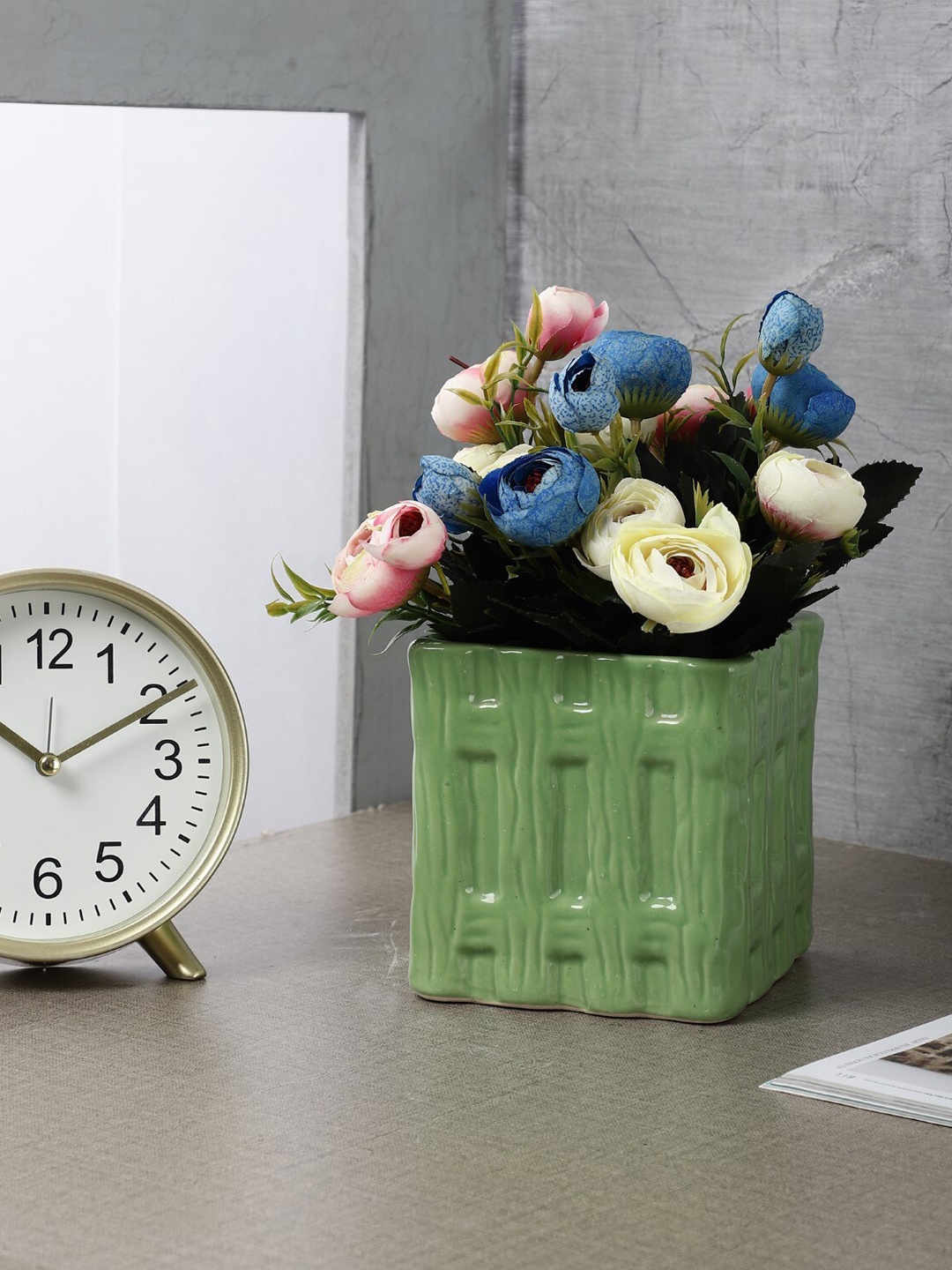 

The Decor Mart Green Textured Ceramic Planter