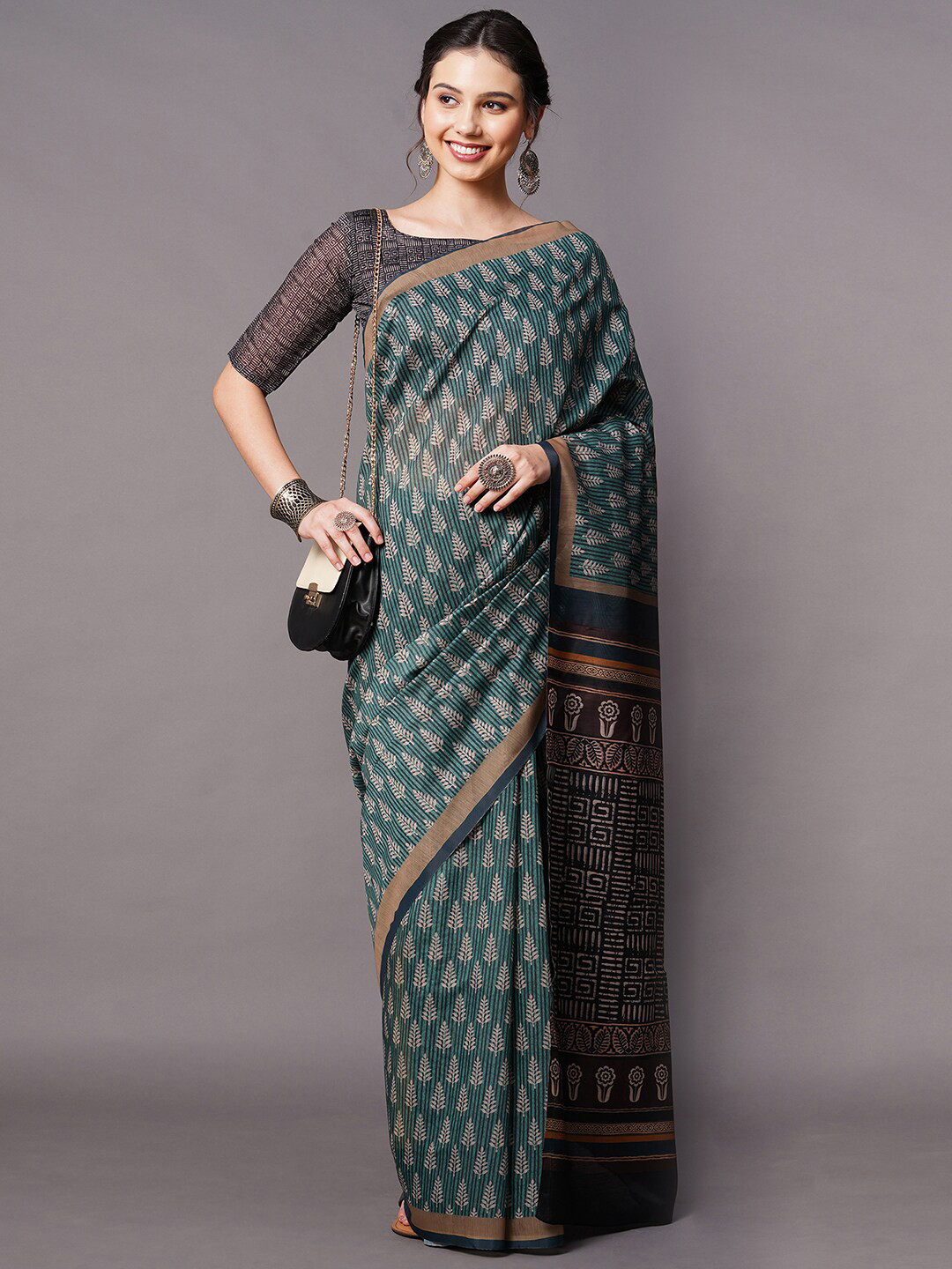 

Mitera Teal Blue & Beige Floral Bhagalpuri Art Silk Saree