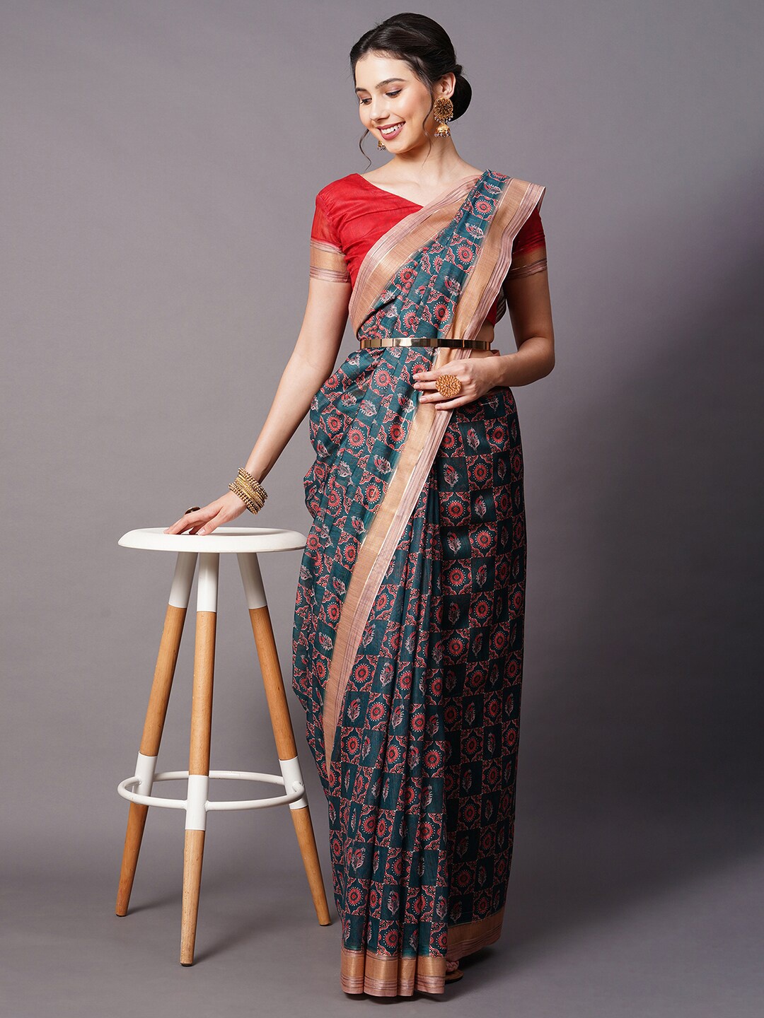 

Mitera Teal & Pink Woven Design Linen Blend Saree