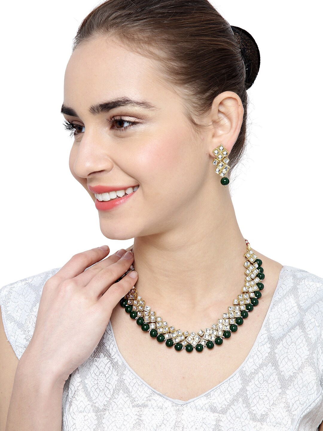 

Shining Diva Gold-Plated & White Kundan Stone Studded & Green Beaded Jewellery set