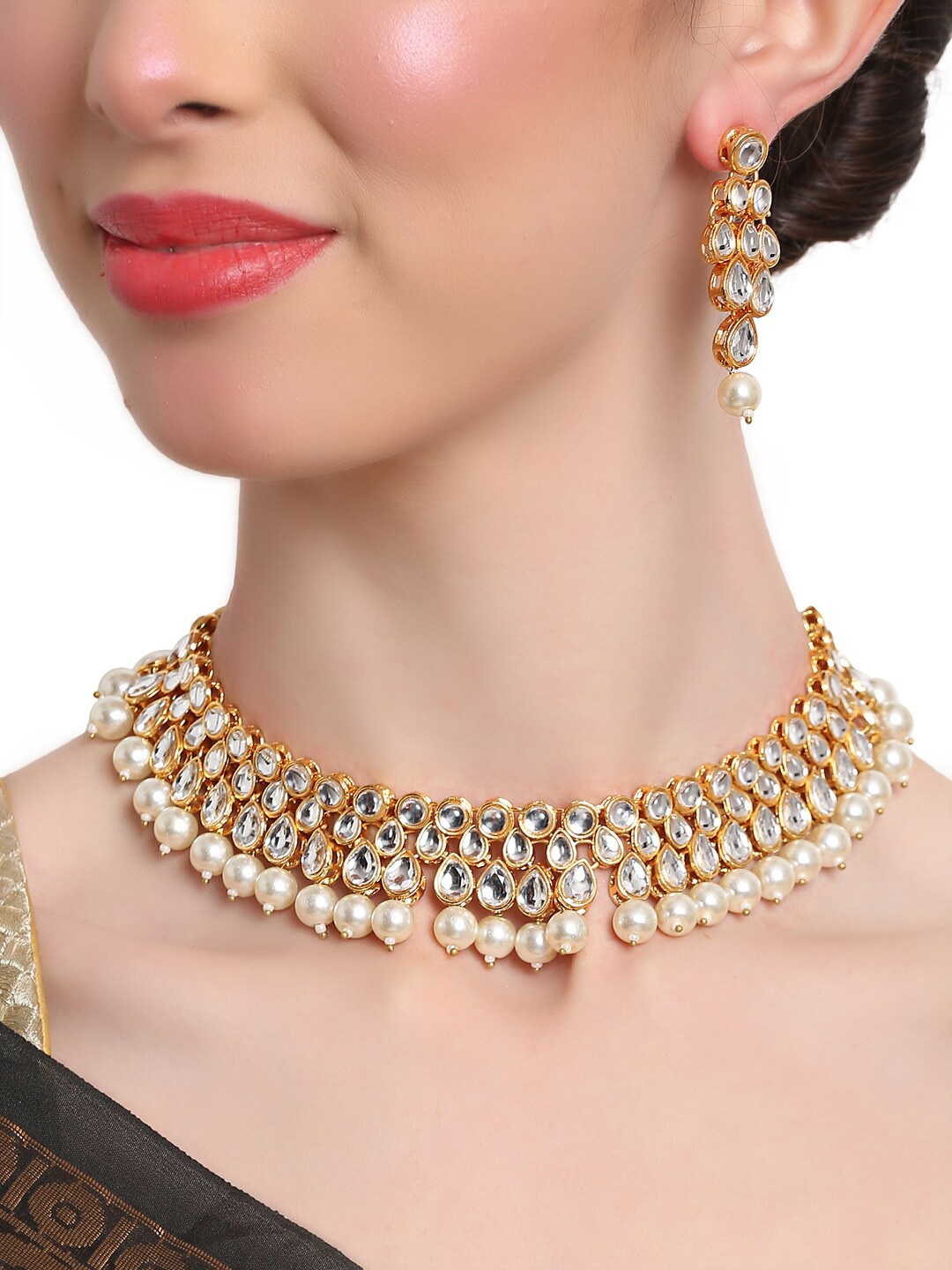 

Shining Diva Gold-Plated White Kundan Studded & Beaded Jewellery Set