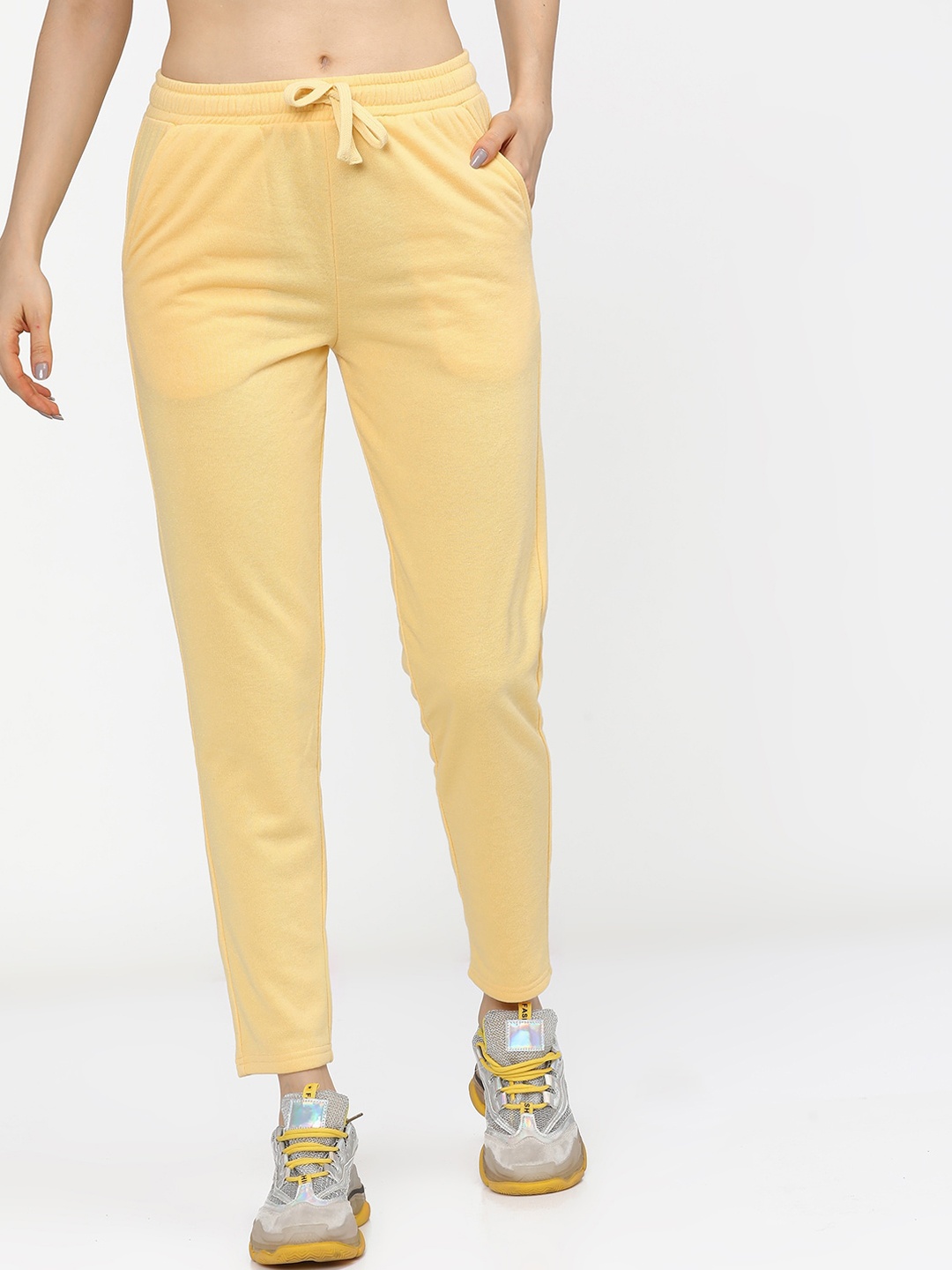 

Tokyo Talkies Women Yellow Solid Slim Fit Track Pants