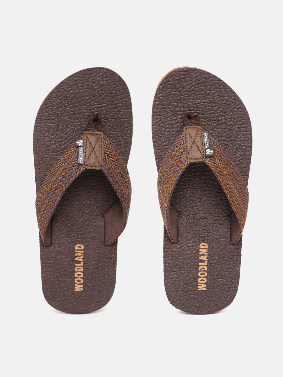 

Woodland Men Brown & Navy Blue Self-Design & Textured Thong Flip-Flops