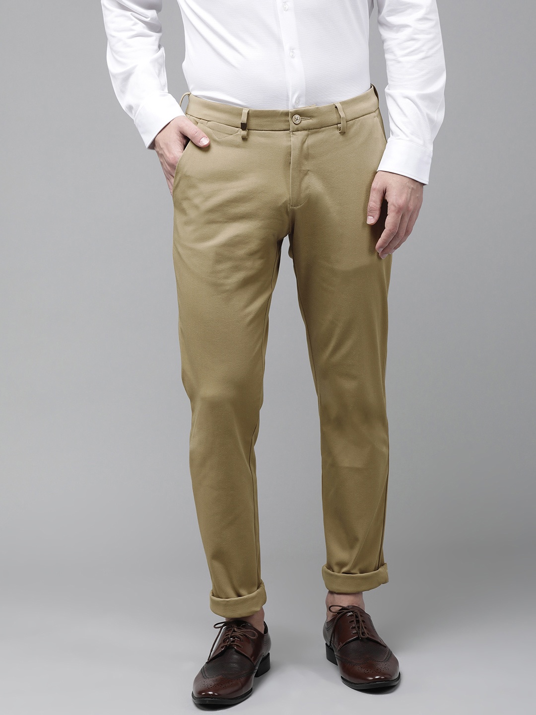 

Van Heusen Men Beige Solid Slim Fit Trousers