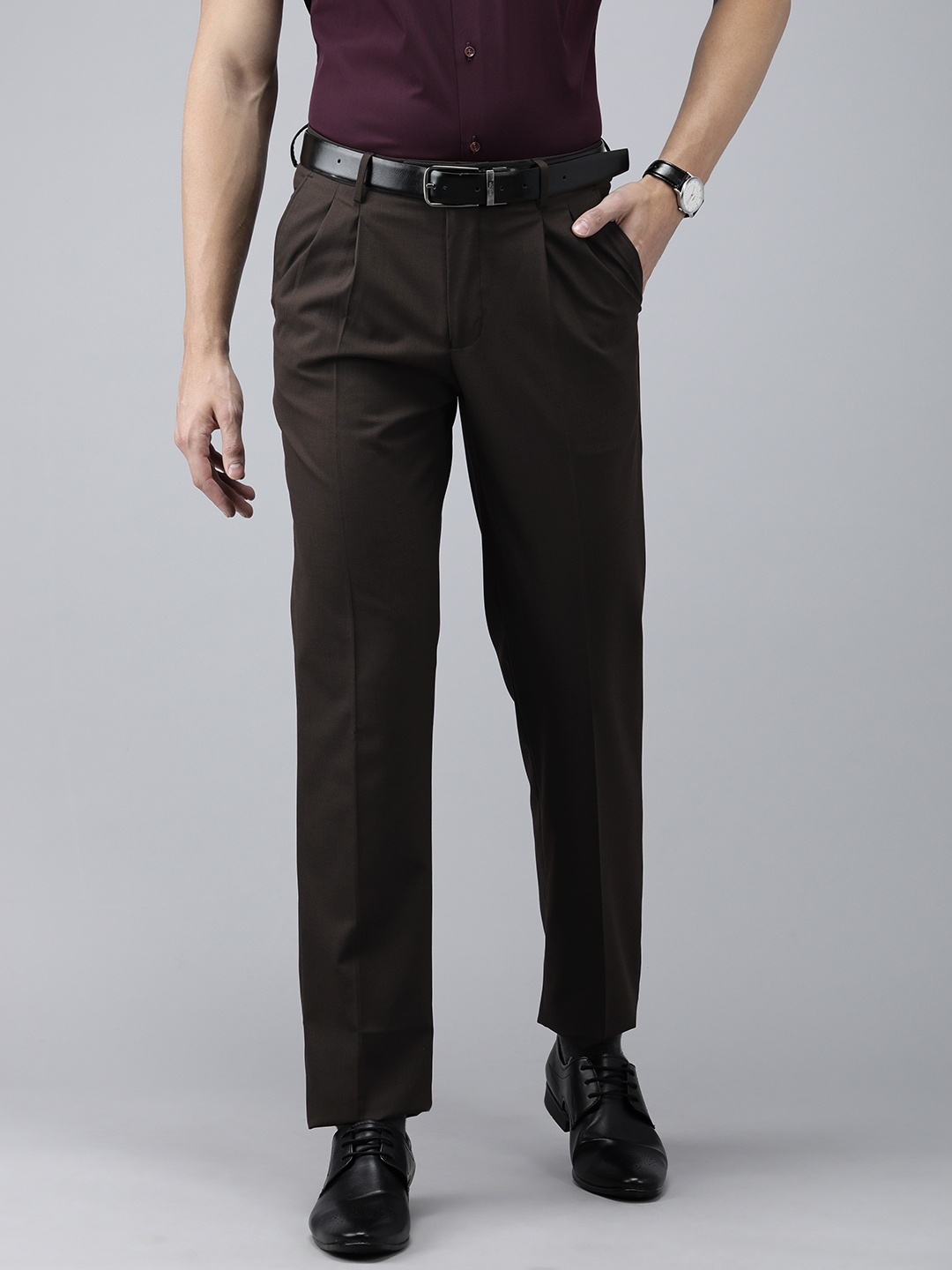 

Van Heusen Men Brown Solid Mid-Rise Formal Trousers