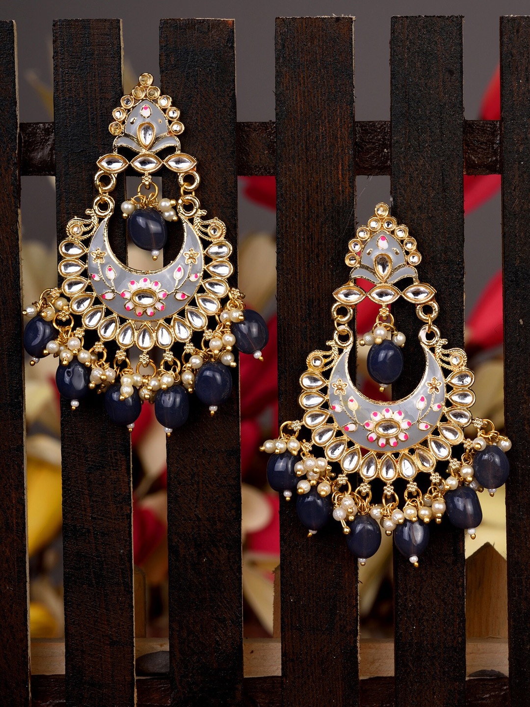 

Saraf RS Jewellery Grey & Gold-Toned Meenakari Floral Chandbalis Earrings
