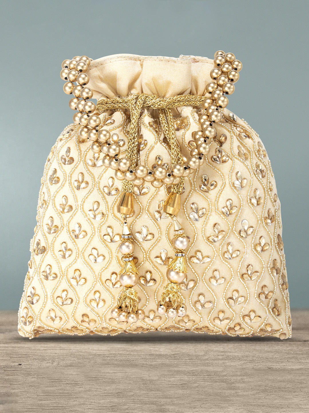 

Peora Cream-Coloured & Gold-Toned Embellished Potli Clutch