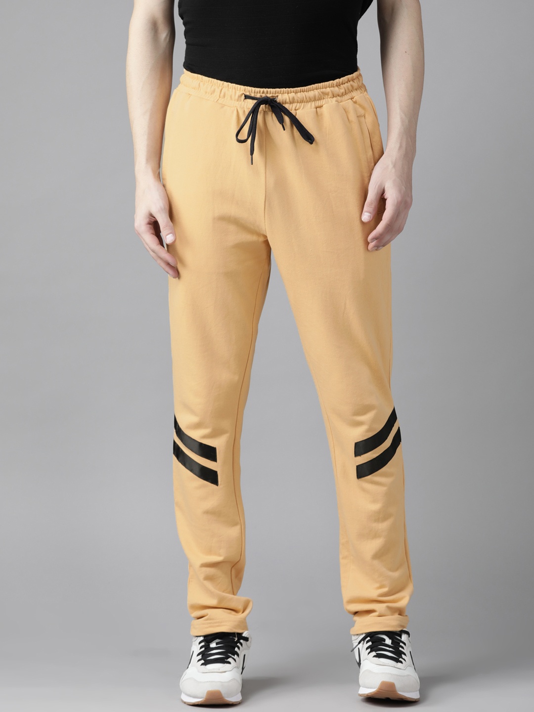 

Van Heusen Sport Men Yellow Pure Cotton Solid Track Pants