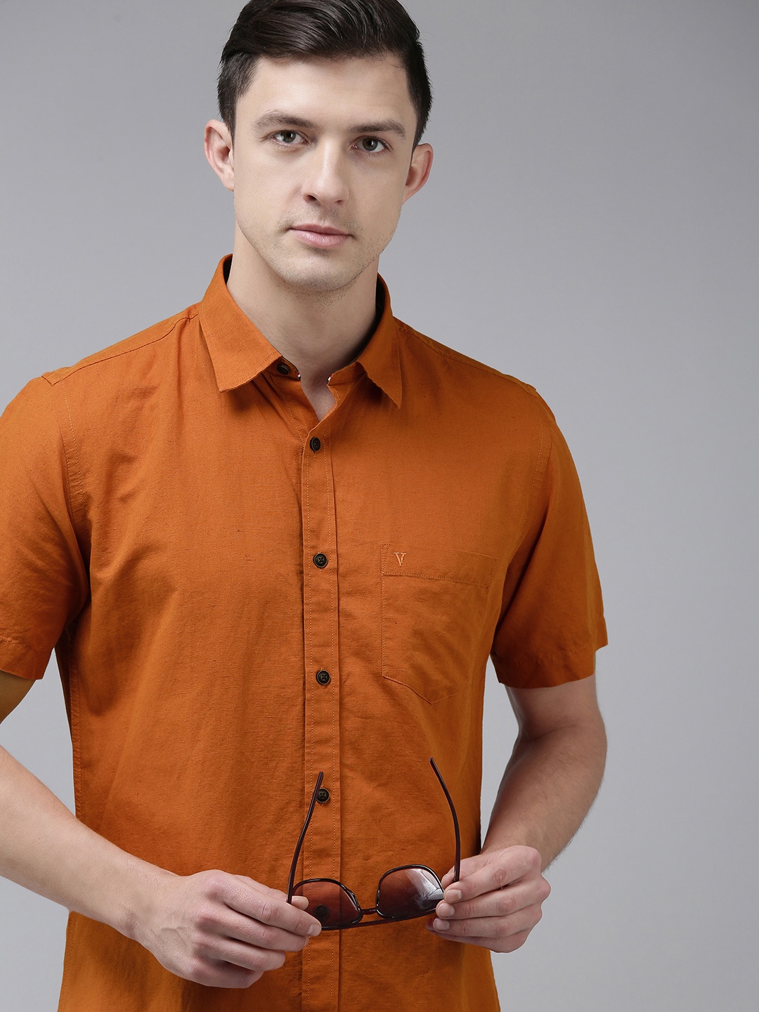 

Van Heusen Sport Men Rust Solid Slim Fit Formal Shirt