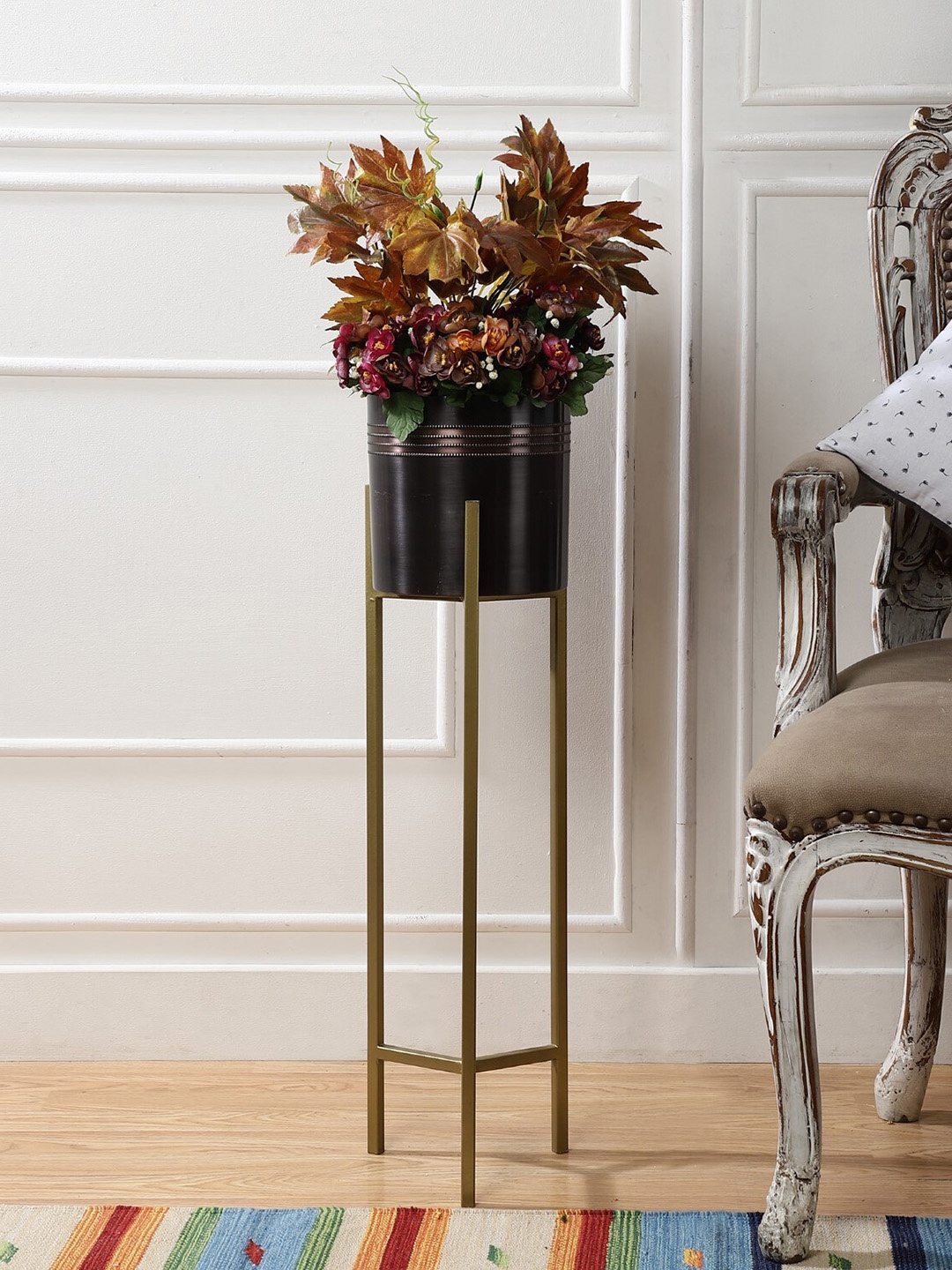 

The Decor Mart Black & Gold-Toned Planter With Stand