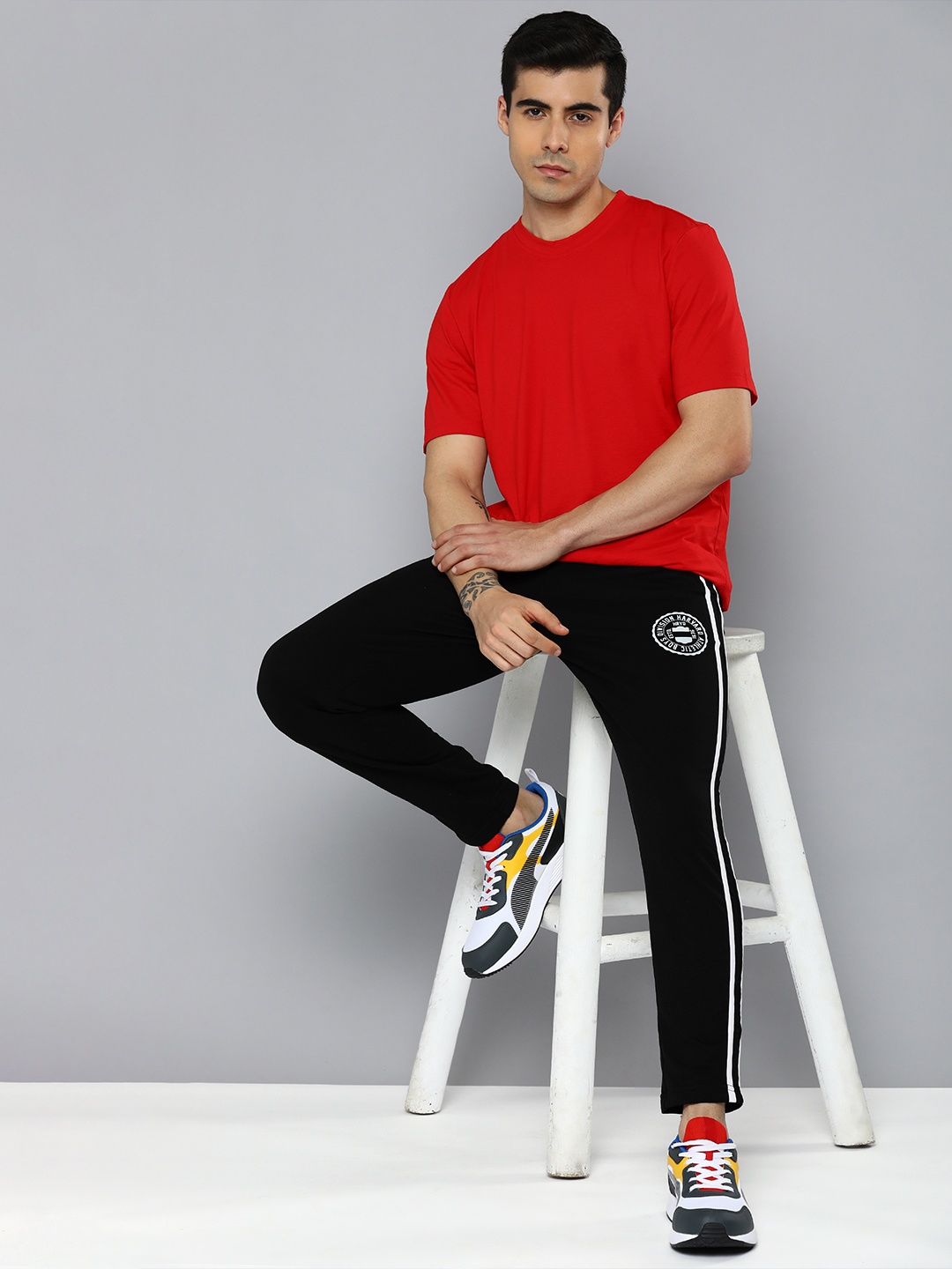 

Harvard Men Black Brand Logo Printed Regular Track Pants With Side Stripes