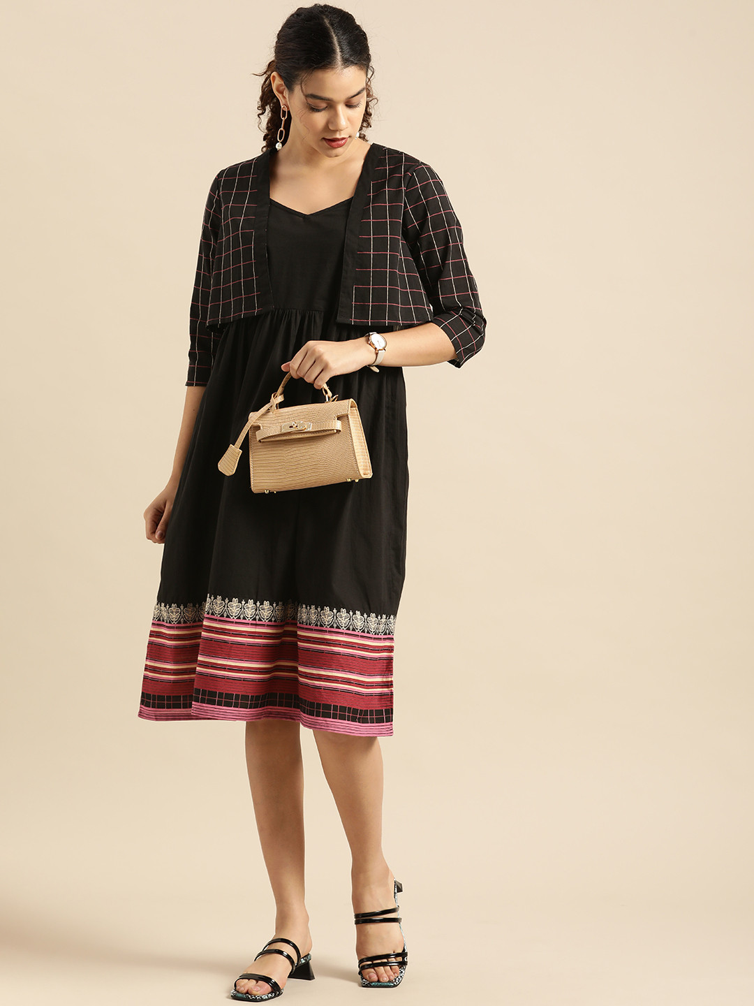 

Anouk Women Black Solid Fit And Flare Sleeveless Dress With Checked Jacket