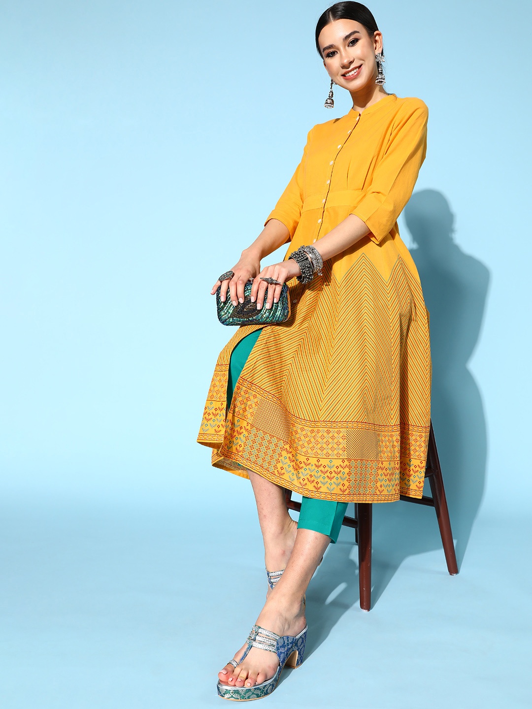 

Anouk Ethnic Motifs Pure Cotton Swirling Volume Kurta Set, Mustard