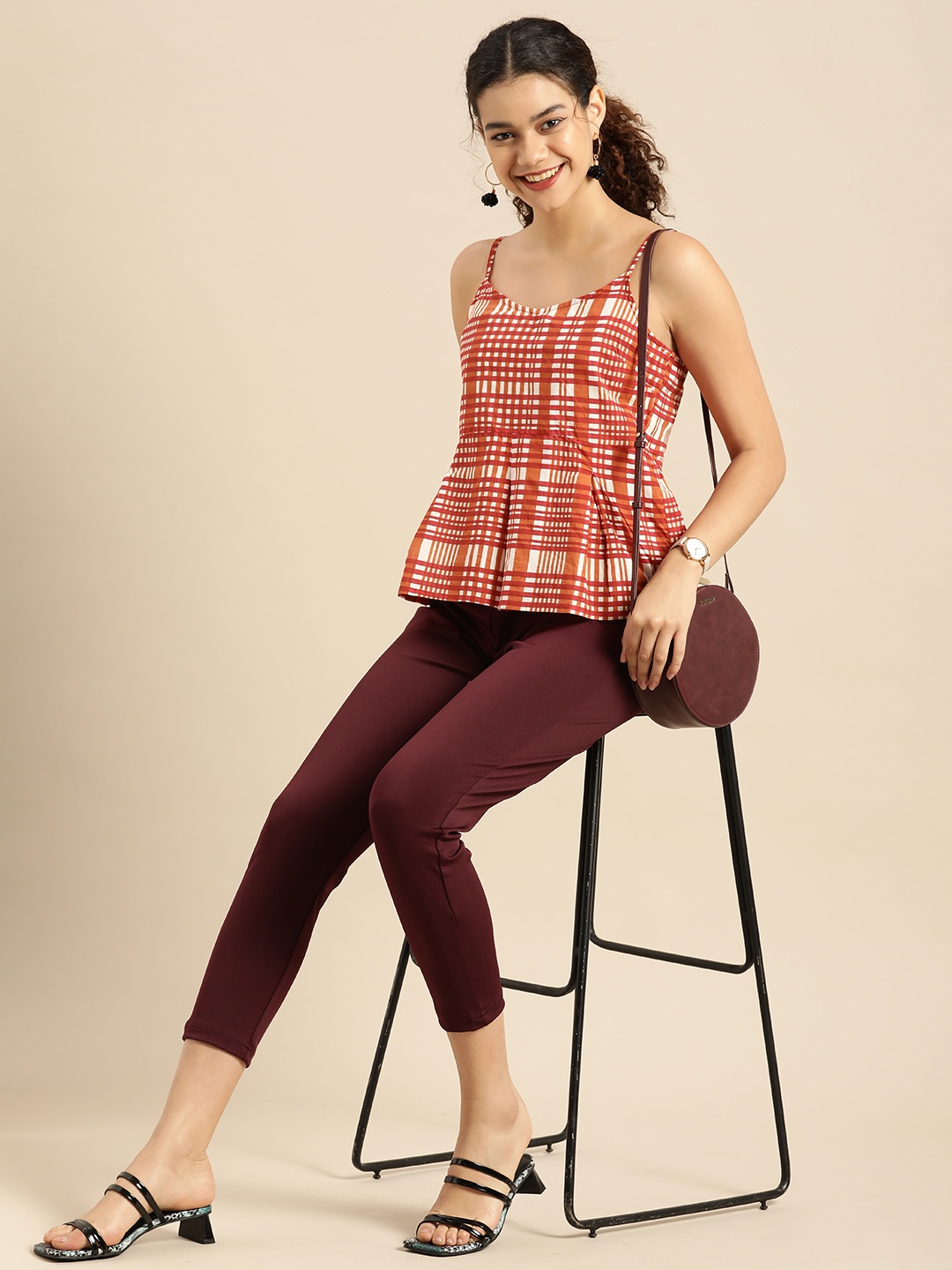 

Anouk Women Red & Orange Checked Sleeveless Peplum Crop Top