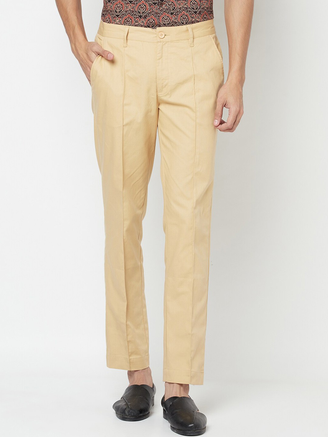 

Fabindia Men Beige Cotton Pleated Trousers