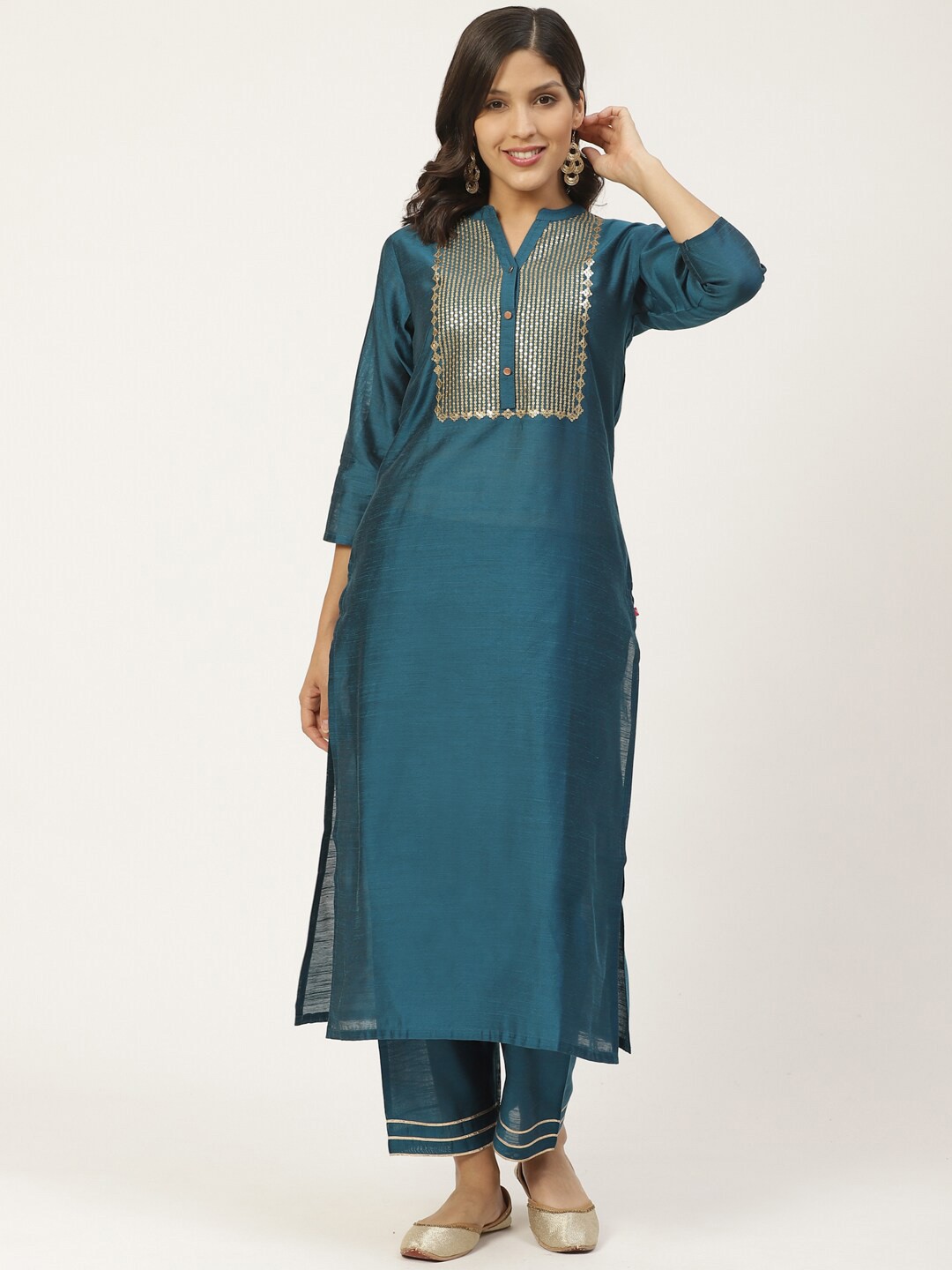 

Varanga Women Teal Embroidered Regular Sequinned Kurti with Palazzos