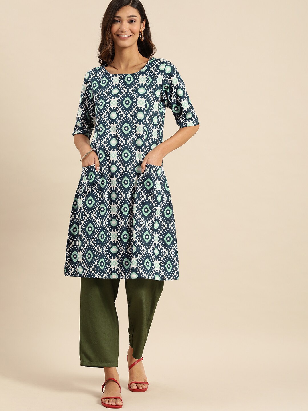 

Varanga Women Blue & White Ethnic Motifs Printed Cotton Kurta
