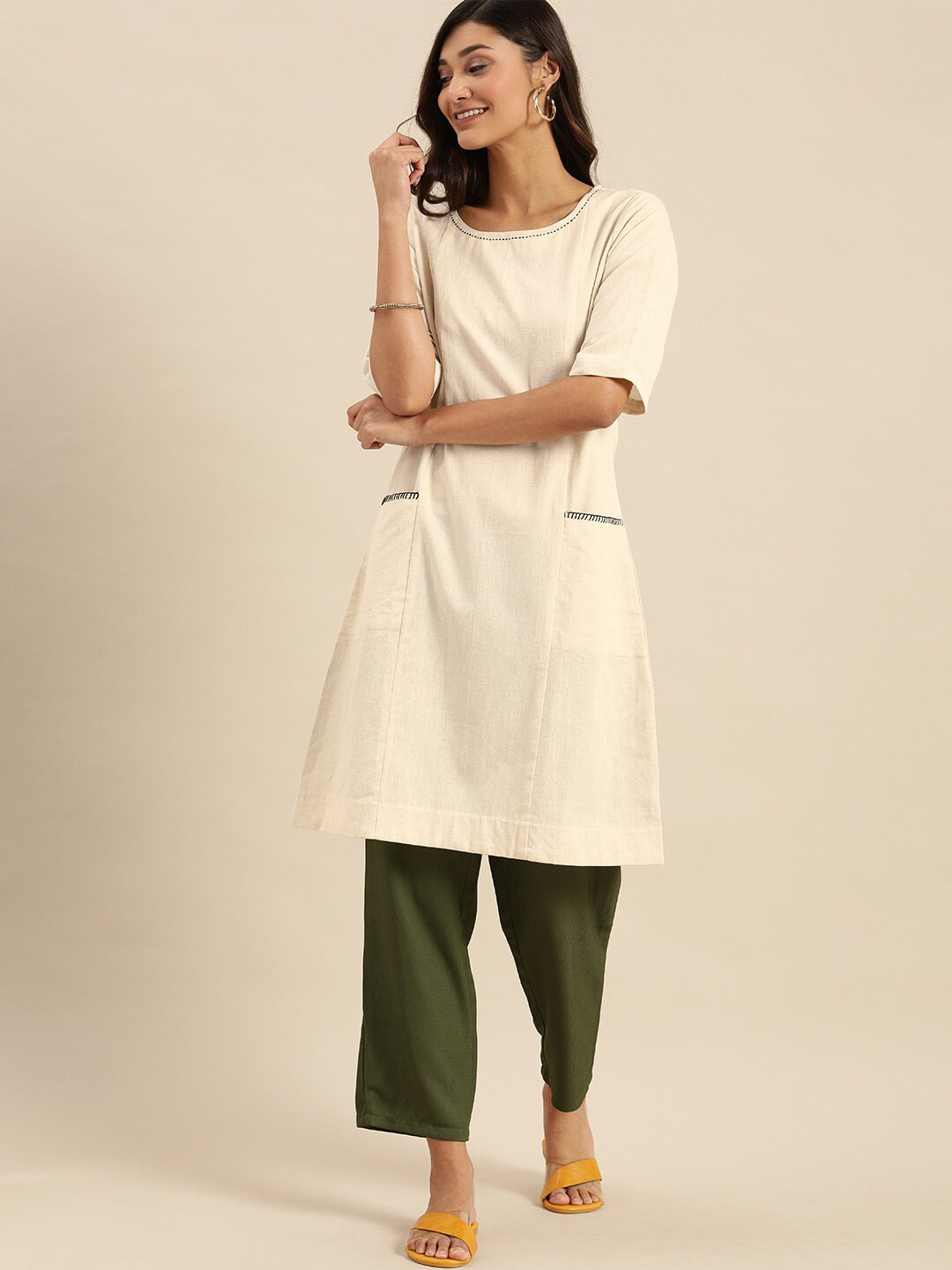 

Varanga Women Off White Boat Neck Cotton Kurta