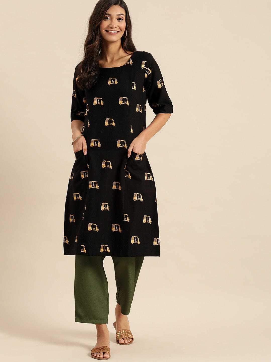 

Varanga Women Black & Gold-Toned Quirky Printed Cotton Kurta