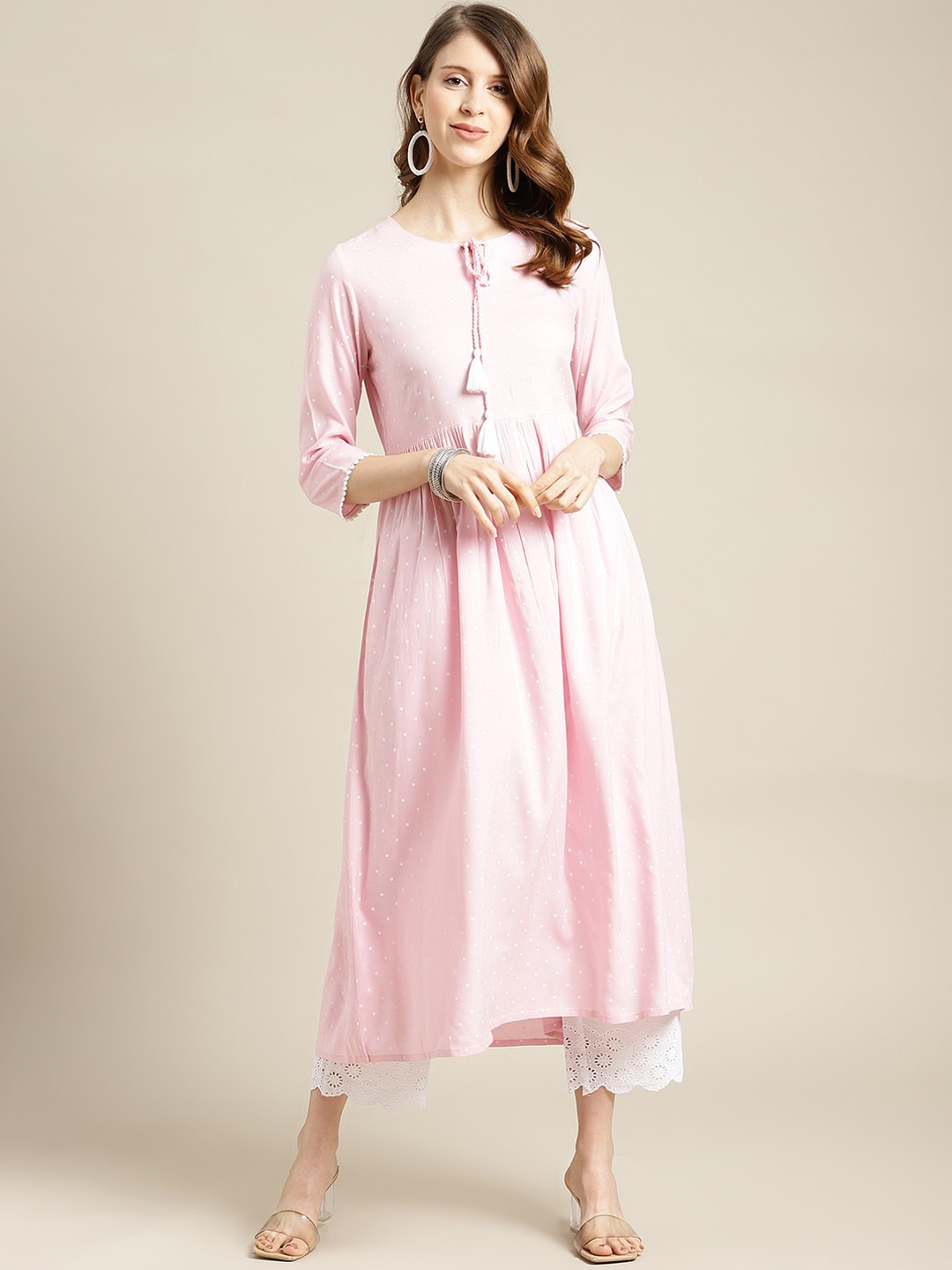 

Varanga Women Pink Flared Sleeves Thread Work Kurta