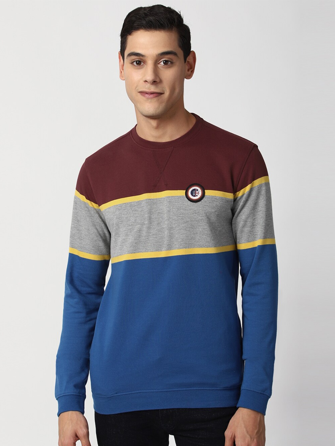 

Peter England Casuals Men Blue Colourblocked Sweatshirt