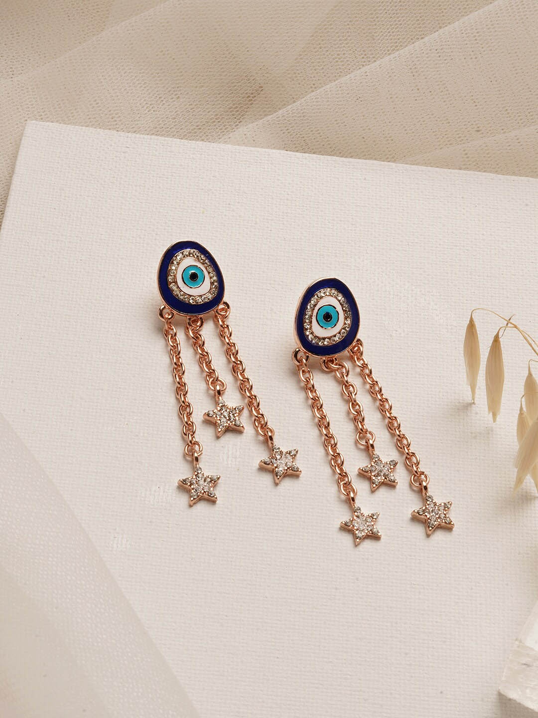 

JOKER & WITCH Rose Gold & Blue Rhinestone Studded Evil Eye Contemporary Drop Earrings