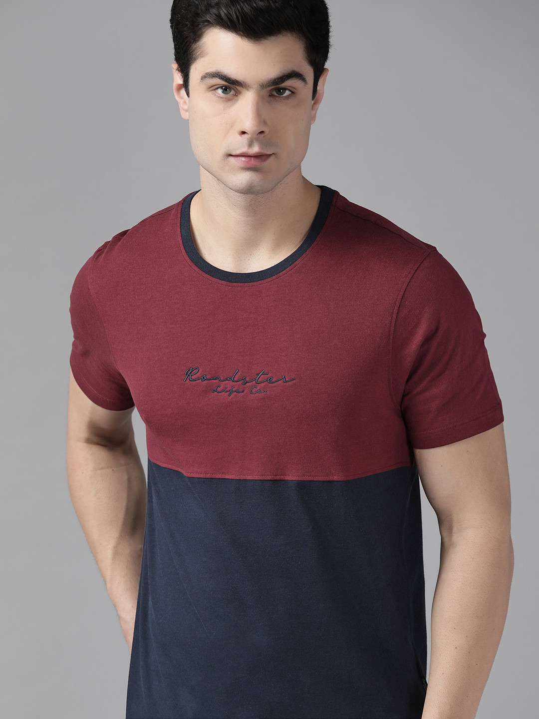 

The Roadster Lifestyle Co Men Navy Blue & Burgundy Colourblocked Pure Cotton T-shirt
