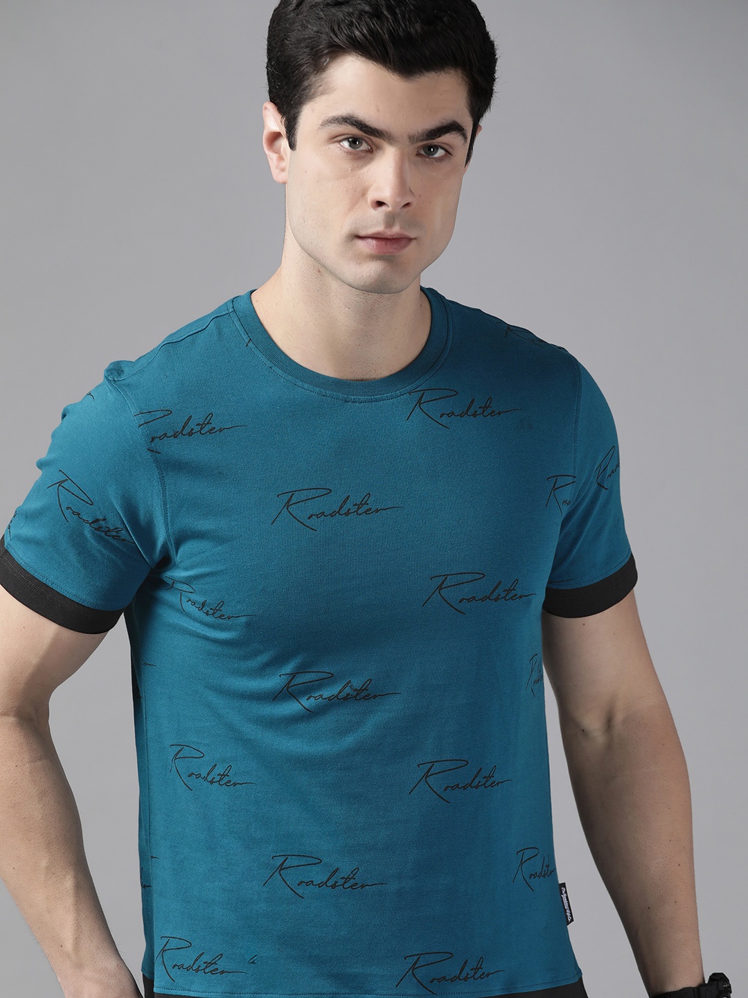 

The Roadster Lifestyle Co Men Teal Blue & Black Pure Cotton Brand Logo Printed T-shirt