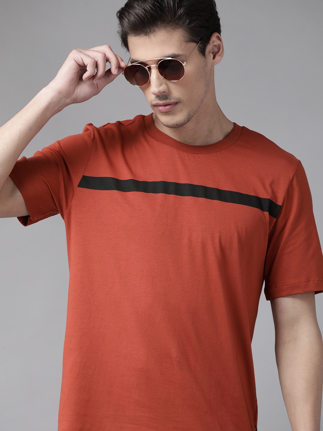

The Roadster Lifestyle Co Men Rust Red Striped T-shirt