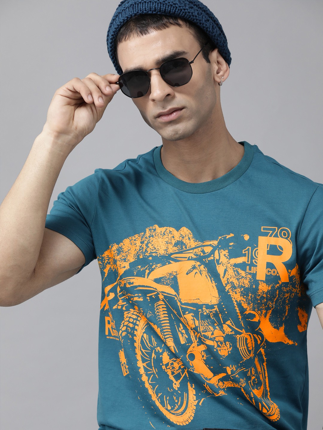 

Roadster Men Teal Yellow Pure Cotton Biker Printed T-shirt