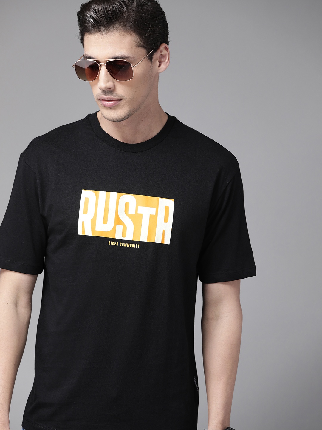 

The Roadster Lifestyle Co Men Black & Mustard Yellow Brand Logo Printed Pure Cotton T-shirt