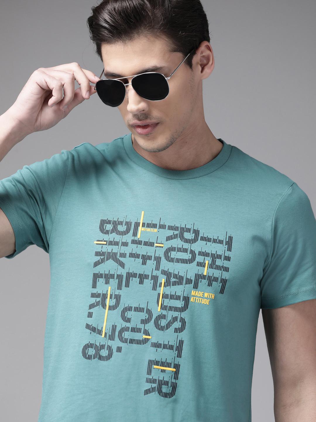 

The Roadster Lifestyle Co Men Sea Green & Black Brand Logo Printed Pure Cotton T-shirt