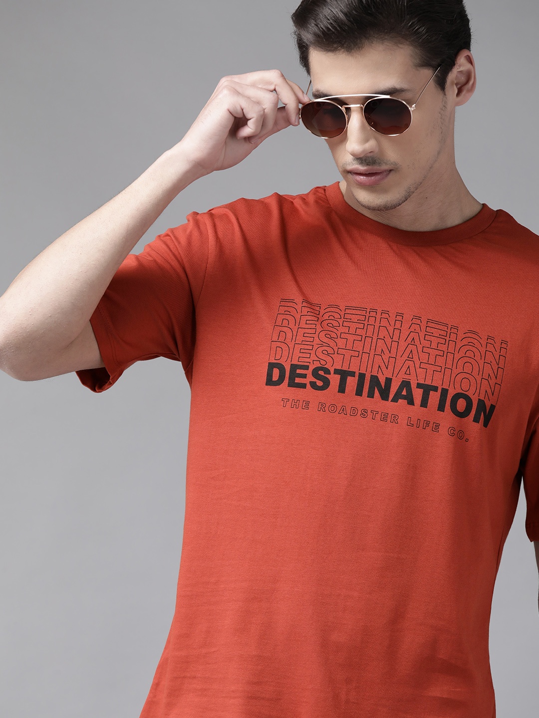 

The Roadster Lifestyle Co Men Rust Orange & Black Typography Printed Cotton T-shirt