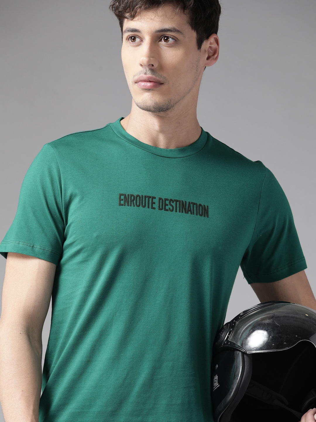 

The Roadster Lifestyle Co Men Green Pure Cotton Typography Printed T-shirt