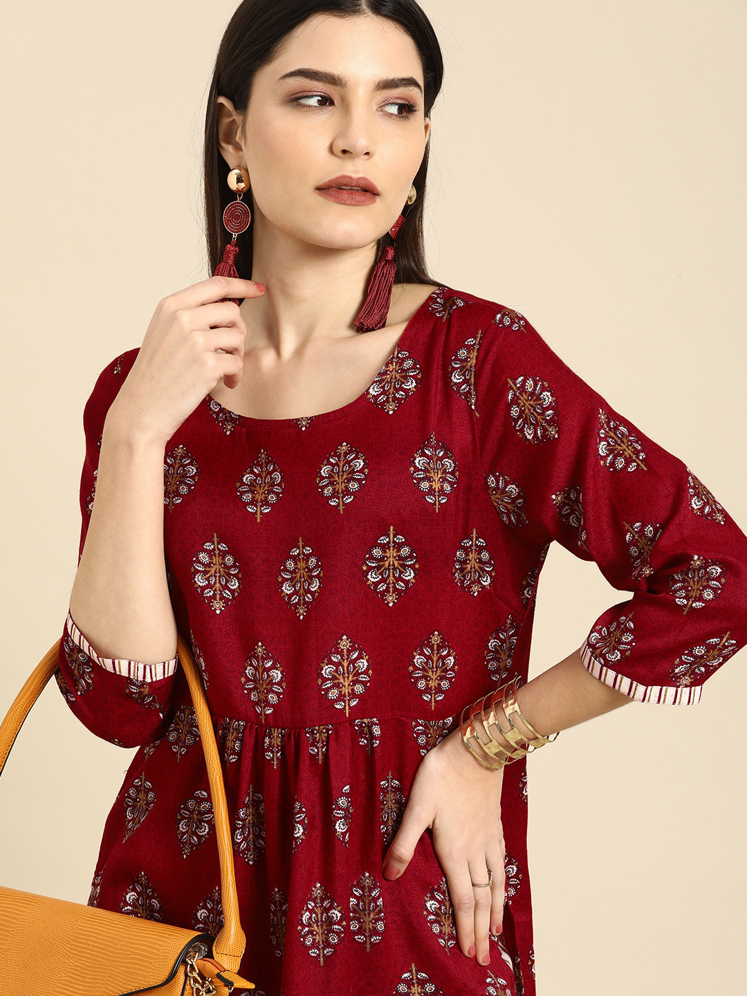 

Anouk Women Maroon Ethnic Motifs Printed Pleated Gotta Patti Kurta with Trousers