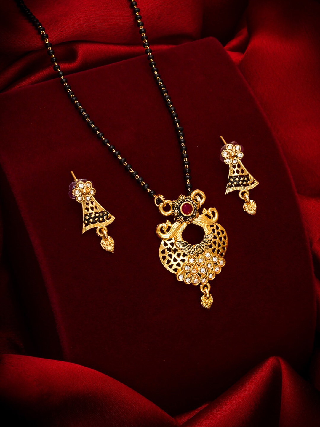 

aadita Gold-Toned & Black AD Studded Mangalsutra Sets