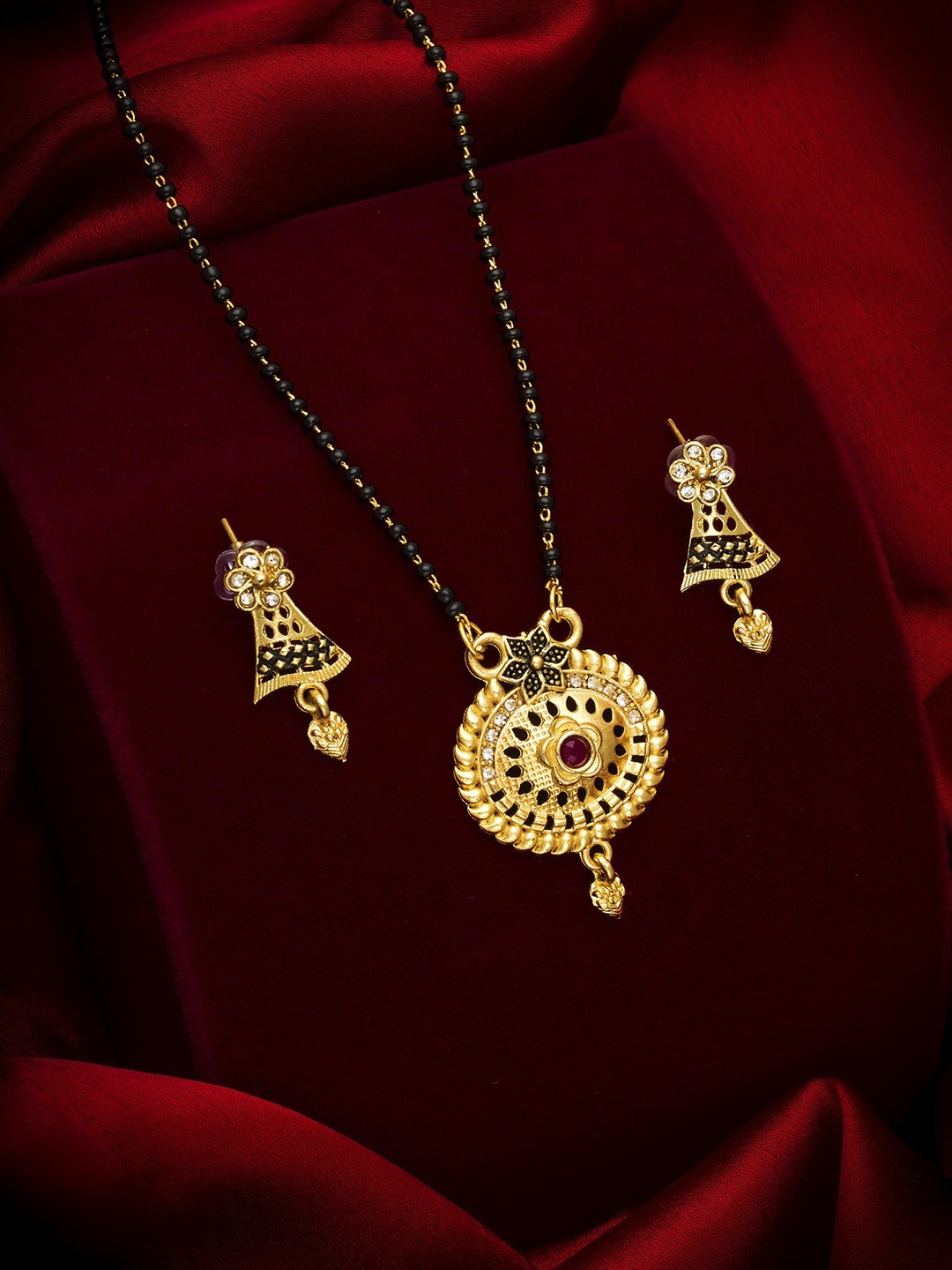 

aadita Gold-Toned & Black AD Stone Studded Mangalsutra with Earrings