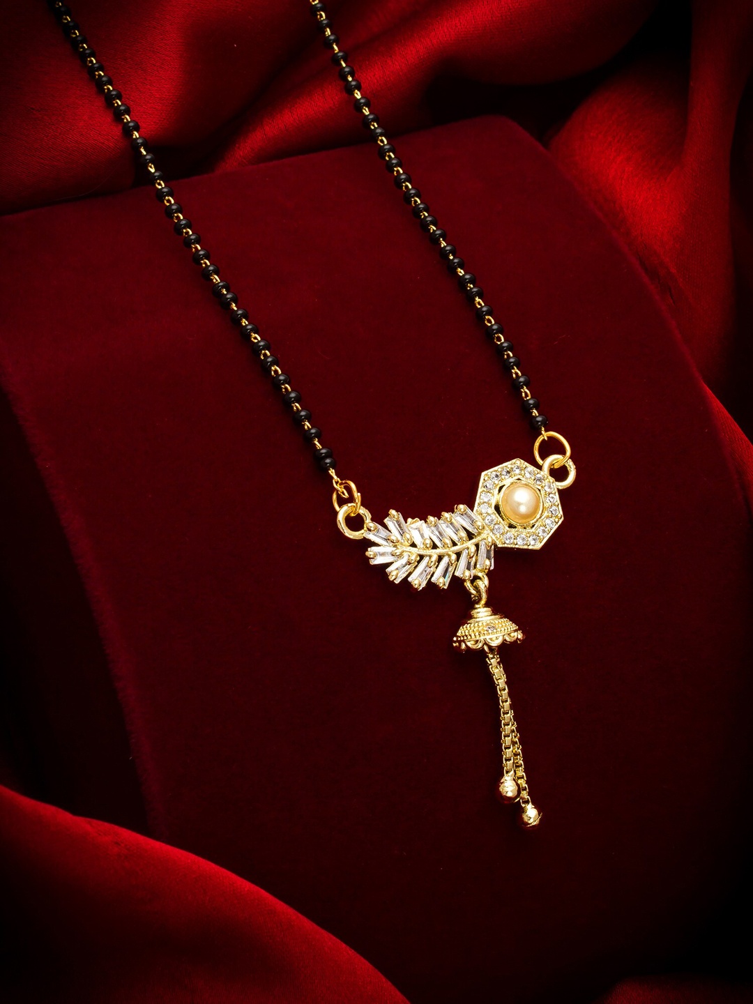 

aadita Gold-Toned Black & White AD-Studded & Beaded Mangalsutra